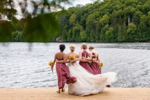 Bride and her bridesmaids on dock